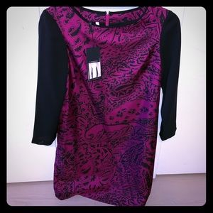 Never worn with tags beautiful silk dress!